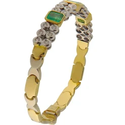 Bracciale in oro giallo e bianco con smeraldi e brillanti