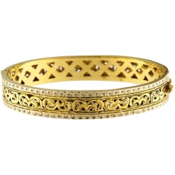 Bracciale rigido in oro giallo e bianco