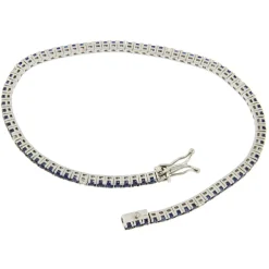 Guidetti | Bracciale tennis in oro bianco con zaffiri e diamanti