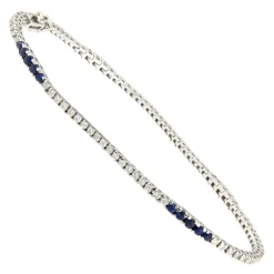 Guidetti | Bracciale tennis in oro bianco con diamanti e zaffiri