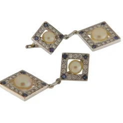 Orecchini pendenti in oro bianco con diamanti e perle