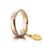 Unoaerre | Fede nuziale “Comoda” in oro rosa mm 4 con brillante ct 0,05